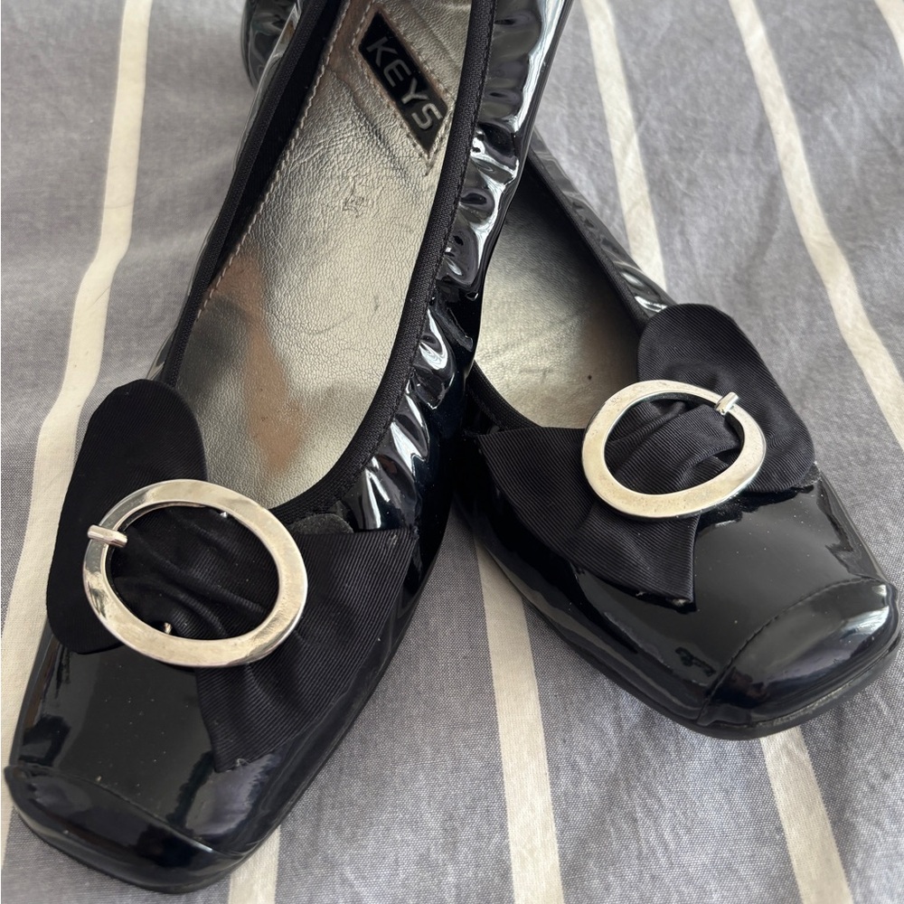 Keys Black Patent Leather Flats with silver buckle detail. Size 40.  Like new!